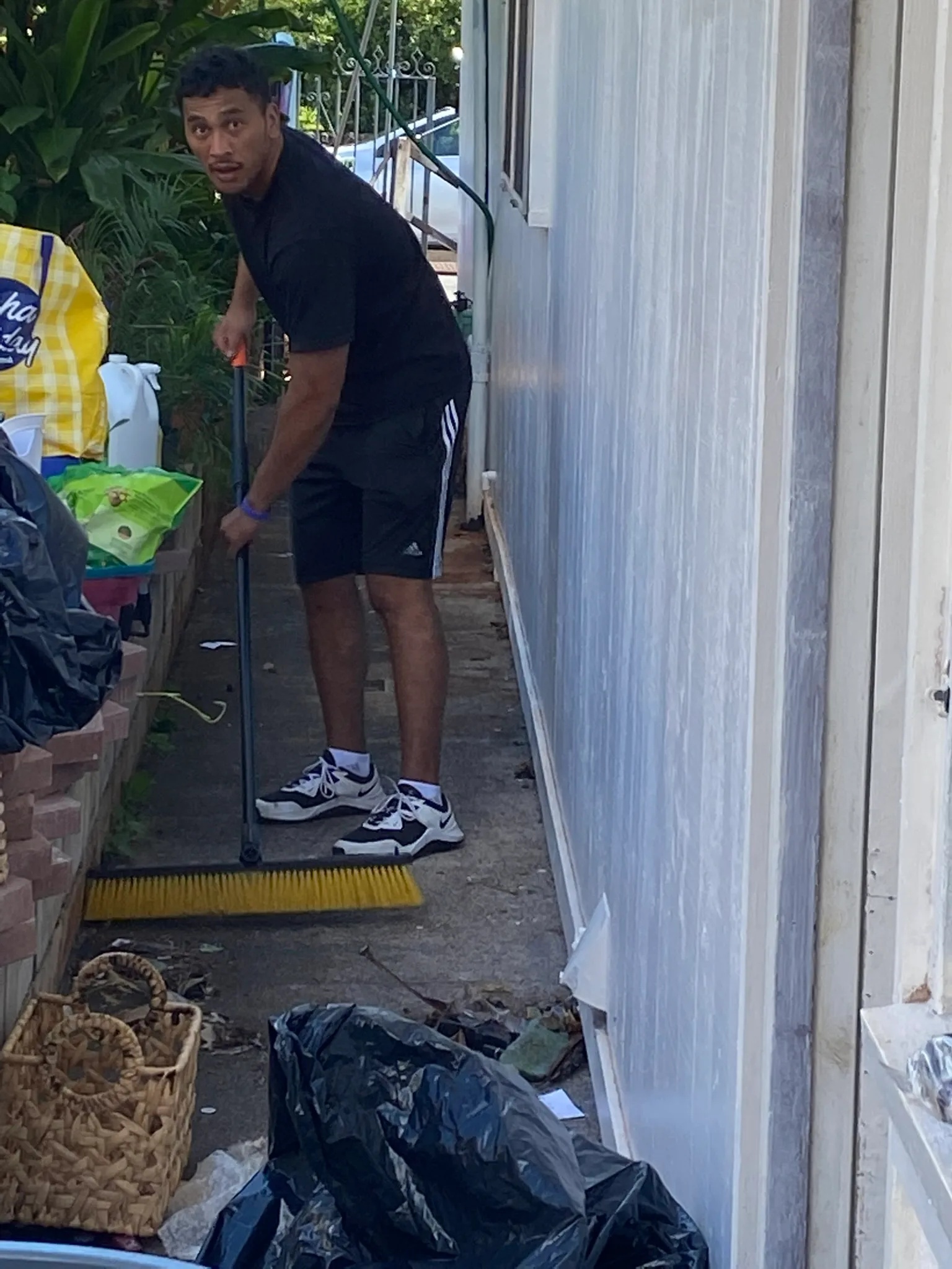 JunkForce team sweeping at the job site